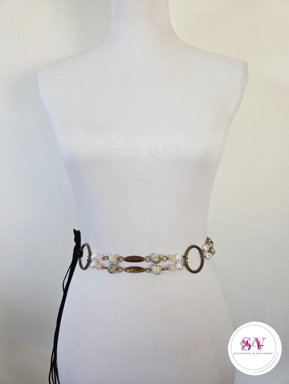 Beaded waist belt with gold ring and black fringe ties